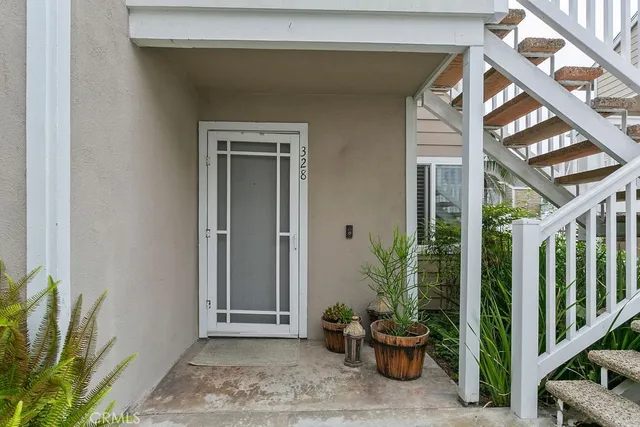 a view of a potted plants in front of a house