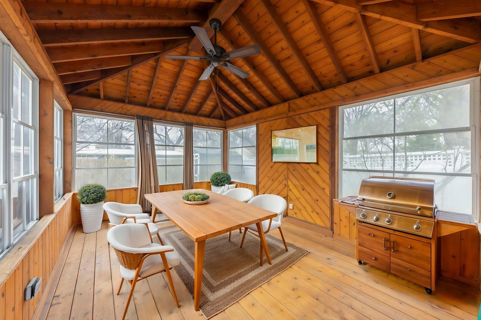 904 Gamon Road Wheaton, IL 60189 - Photo 33 of 47 a dining room with furniture a rug windows and wooden floor