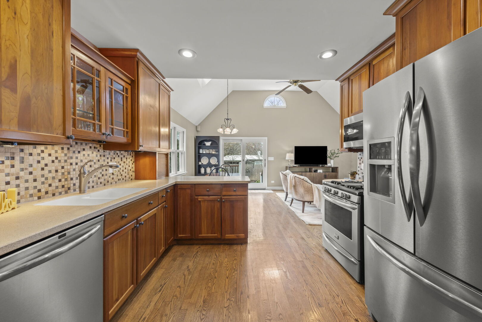 904 Gamon Road Wheaton, IL 60189 - Photo 9 of 47 a kitchen with stainless steel appliances a refrigerator sink and microwave