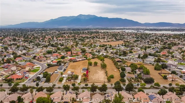 an aerial view of residential house and green space