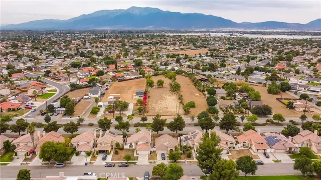 an aerial view of residential house with outdoor space