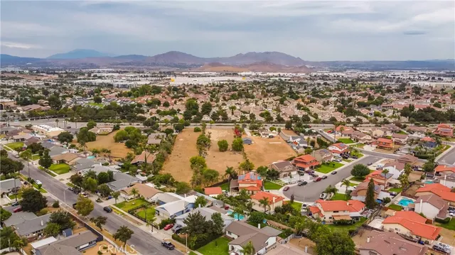 an aerial view of residential house with outdoor space and river