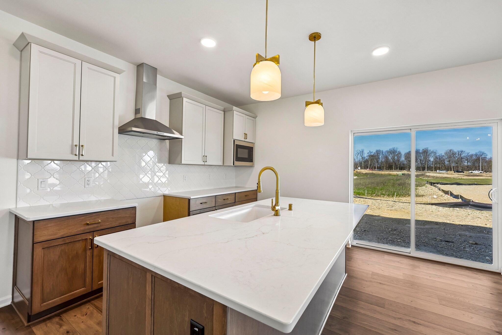 447 Sandstone Street Slinger, WI 53086 - Photo 13 of 38 Spacious Island w/ Overhang for Seating