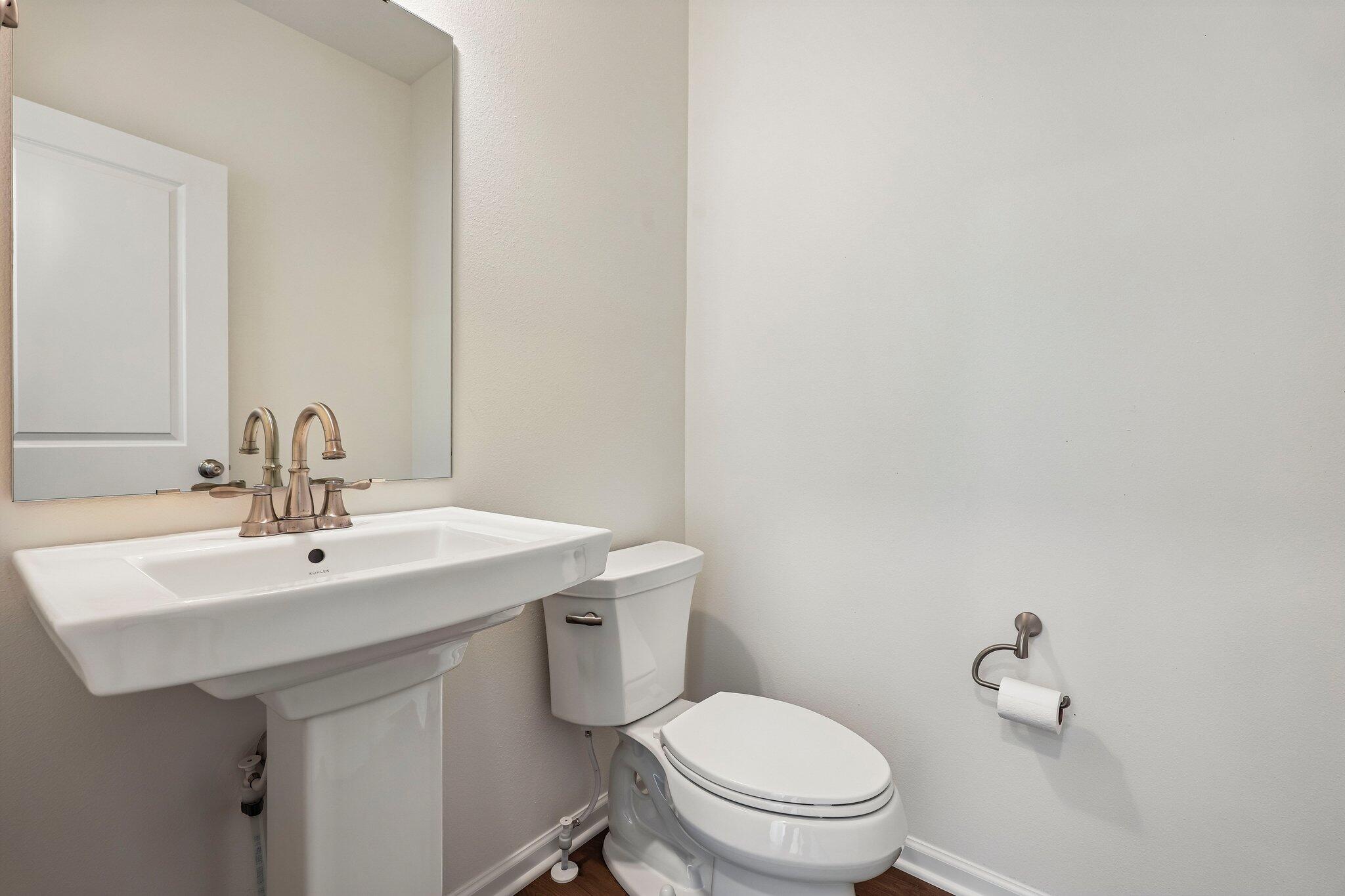 447 Sandstone Street Slinger, WI 53086 - Photo 18 of 38 1st Floor Powder Bath