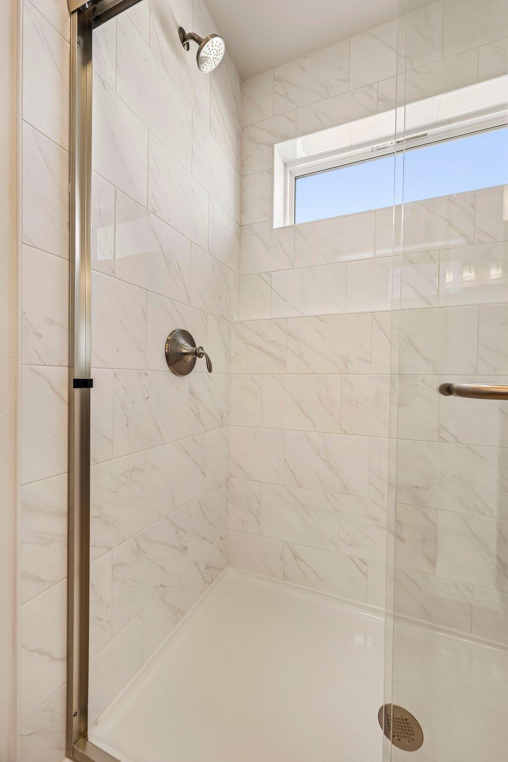 447 Sandstone Street Slinger, WI 53086 - Photo 24 of 38 Primary Tiled Shower