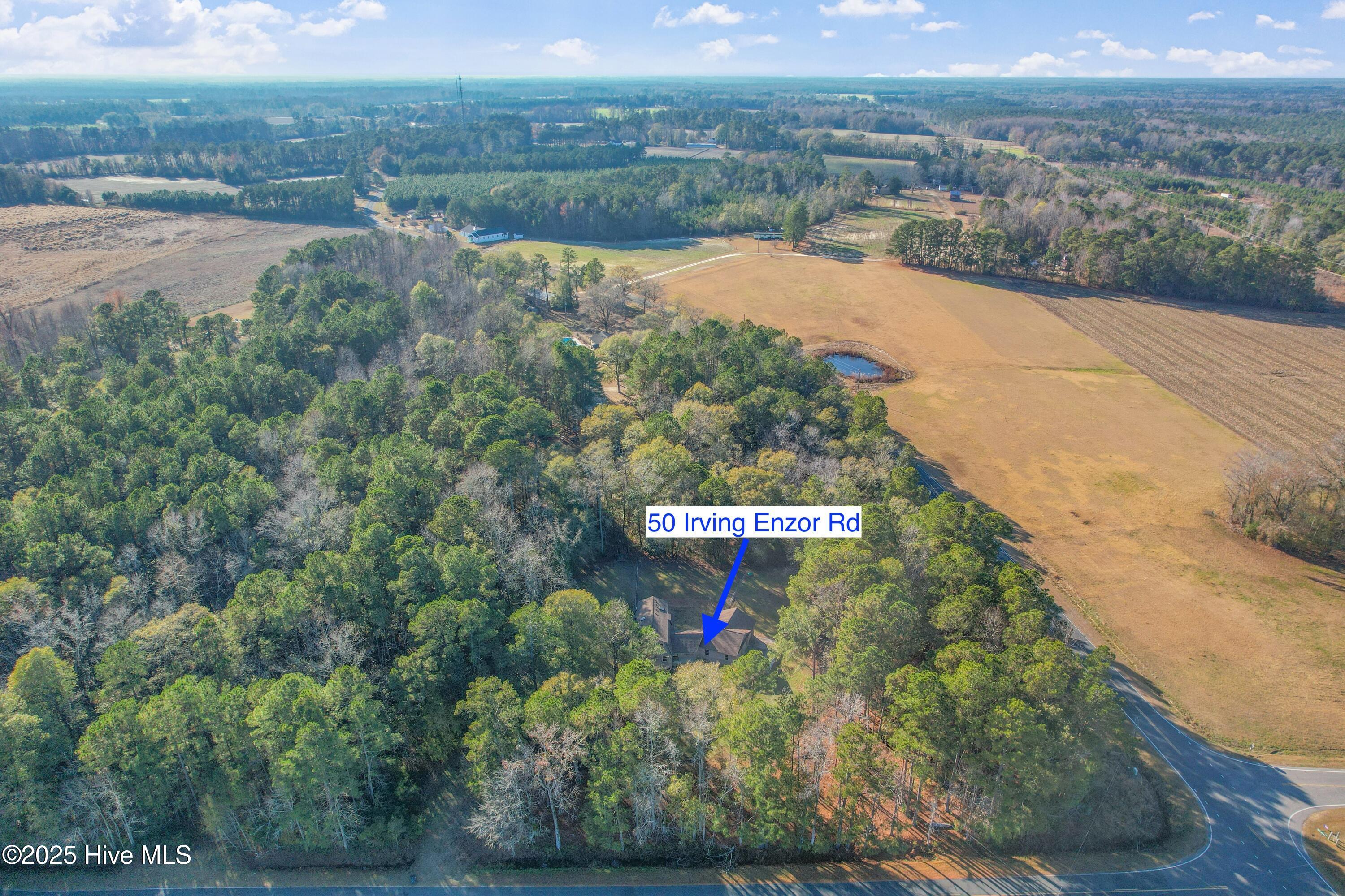 50 Irvin Enzor Road South Fair Bluff, NC 28439 - Photo 28 of 31 Aerial view of surrounding area with arrow towards house