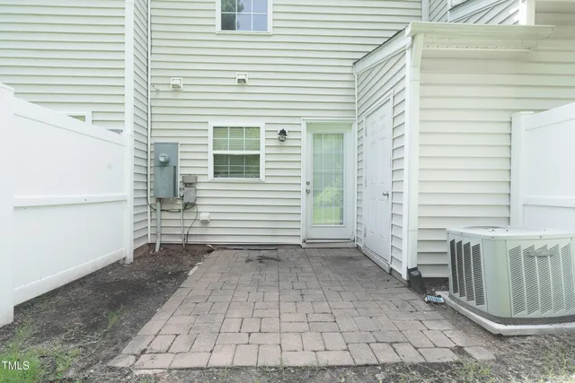 a view of a yard with an outdoor space
