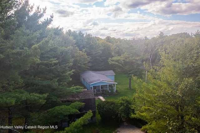 a view of a house with a garden