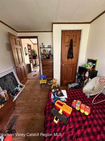 a kitchen with granite countertop a stove a sink and a microwave