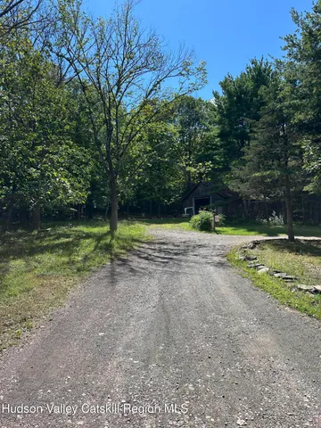a view of a back yard of the house