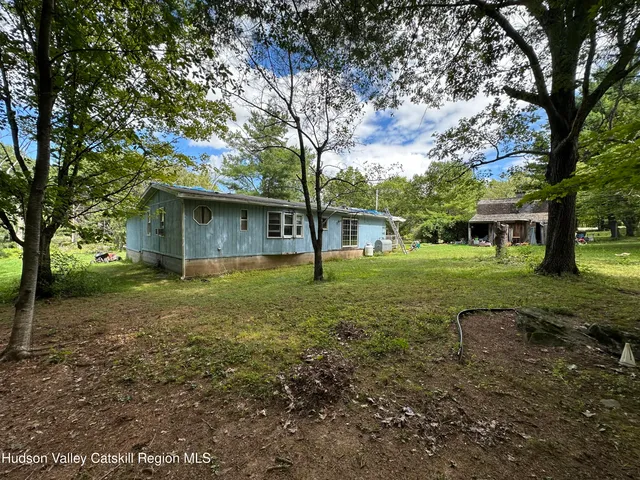 a view of a house with a big yard