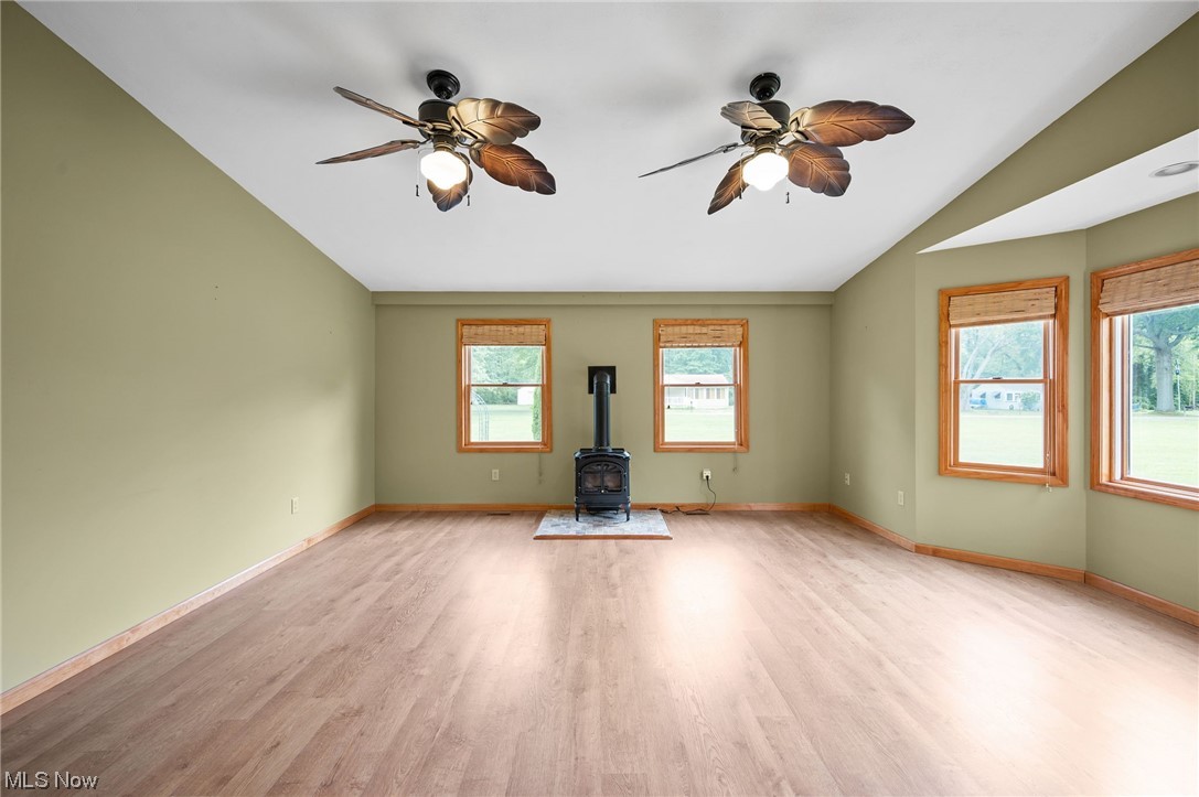 228 Cavalry Road Vermilion, OH 44089 - Photo 16 of 34 Living room with plenty of natural light, and ceiling fan