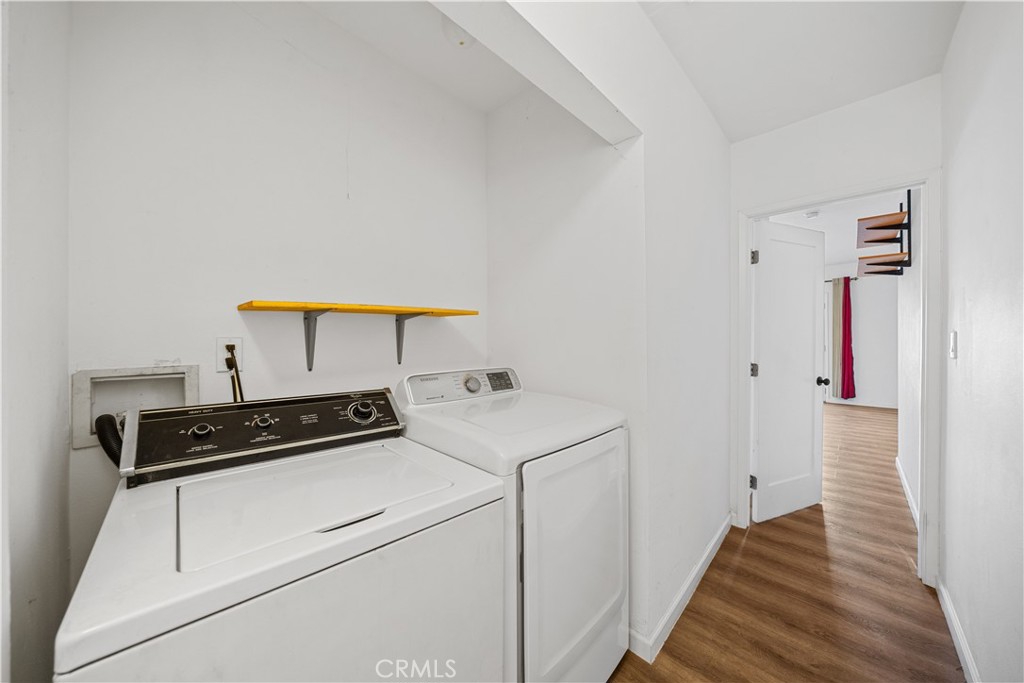202 Mira Mar Avenue Long Beach, CA 90803 - Photo 21 of 49 a kitchen with a stove and a refrigerator