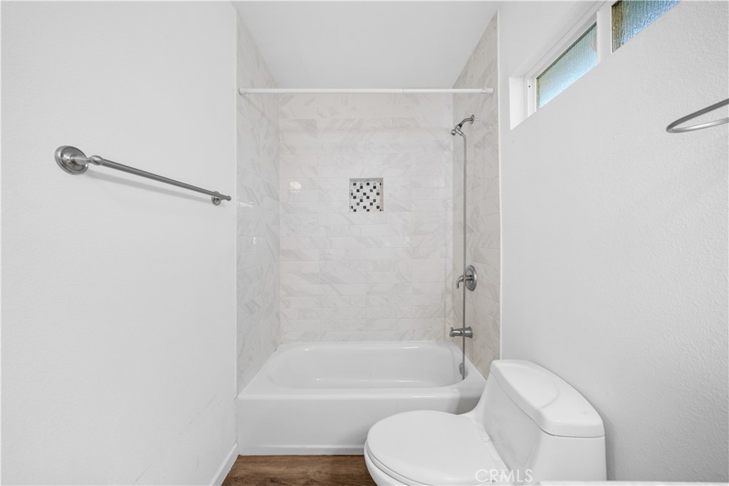 202 Mira Mar Avenue Long Beach, CA 90803 - Photo 25 of 49 a bathroom with a toilet and a shower