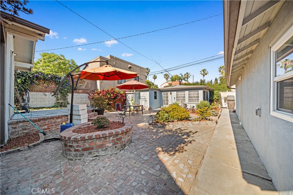 202 Mira Mar Avenue Long Beach, CA 90803 - Photo 26 of 49 a front view of a building with outdoor seating