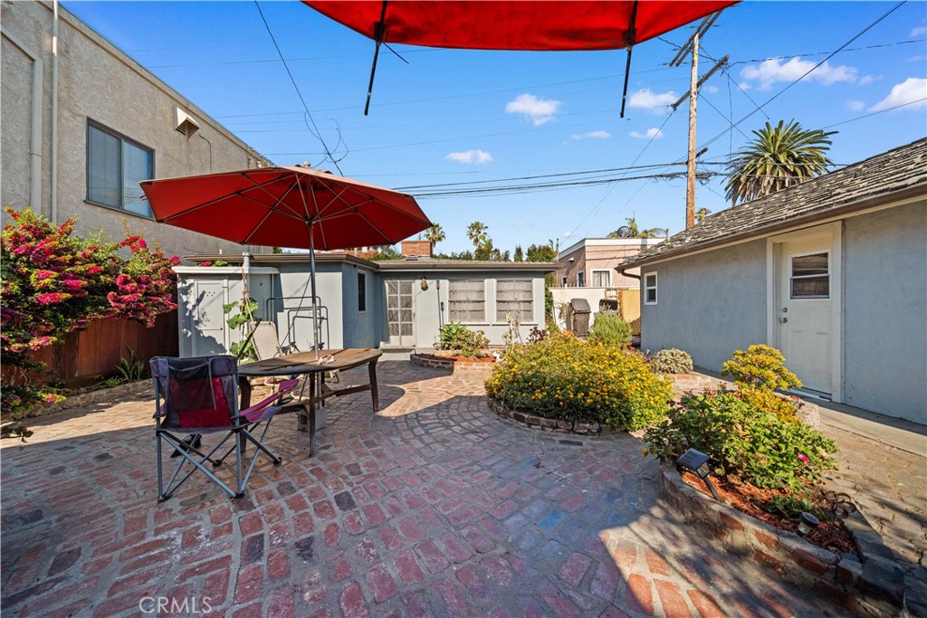 202 Mira Mar Avenue Long Beach, CA 90803 - Photo 27 of 49 a view of a house with a yard