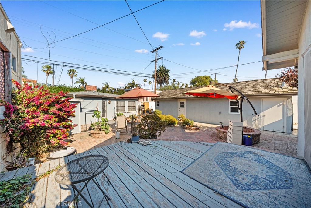 202 Mira Mar Avenue Long Beach, CA 90803 - Photo 28 of 49 a view of a porch with furniture