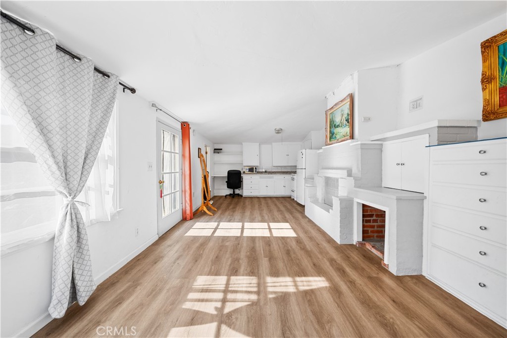 202 Mira Mar Avenue Long Beach, CA 90803 - Photo 38 of 49 a view of living room with furniture and fireplace