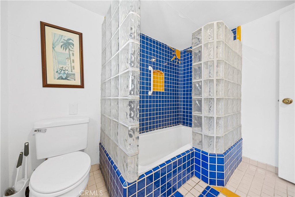202 Mira Mar Avenue Long Beach, CA 90803 - Photo 42 of 49 a bathroom with a toilet and a shower