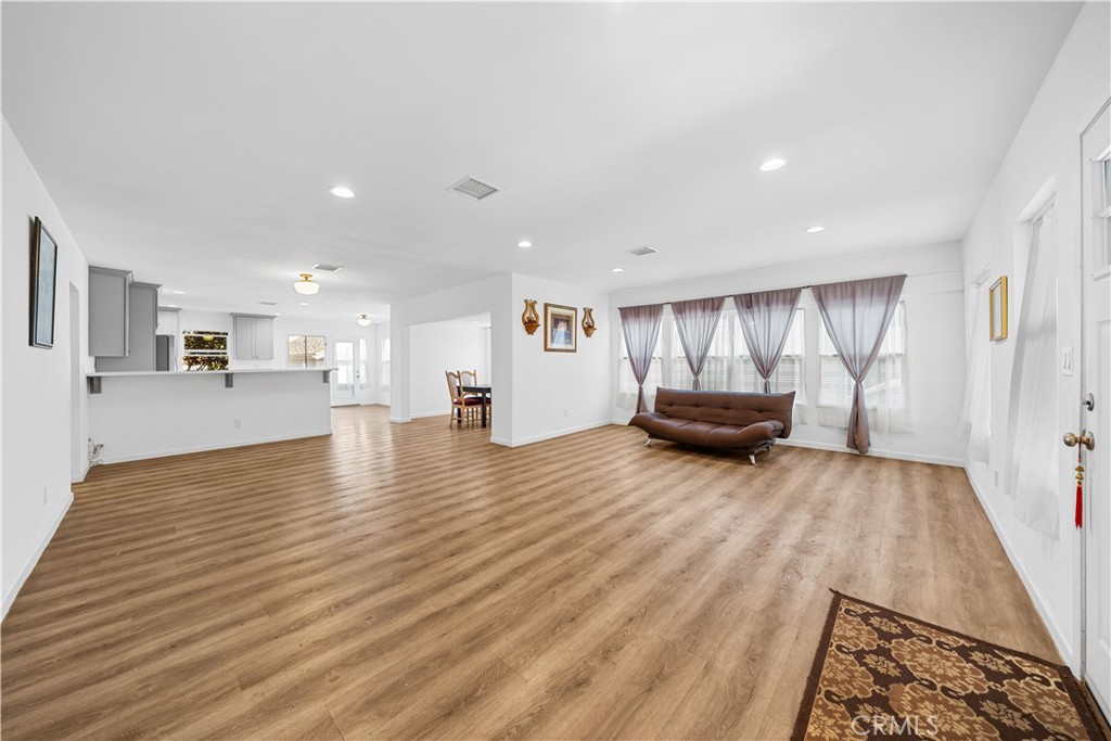 202 Mira Mar Avenue Long Beach, CA 90803 - Photo 5 of 49 a view of livingroom with furniture and wooden floor