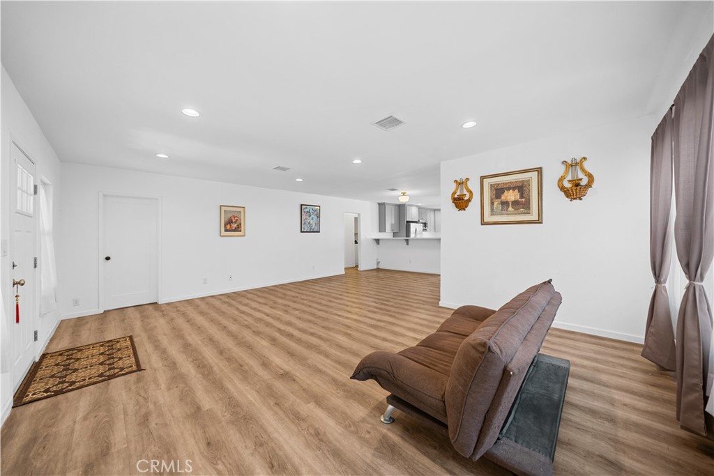 202 Mira Mar Avenue Long Beach, CA 90803 - Photo 7 of 49 a bedroom with a bed and furniture