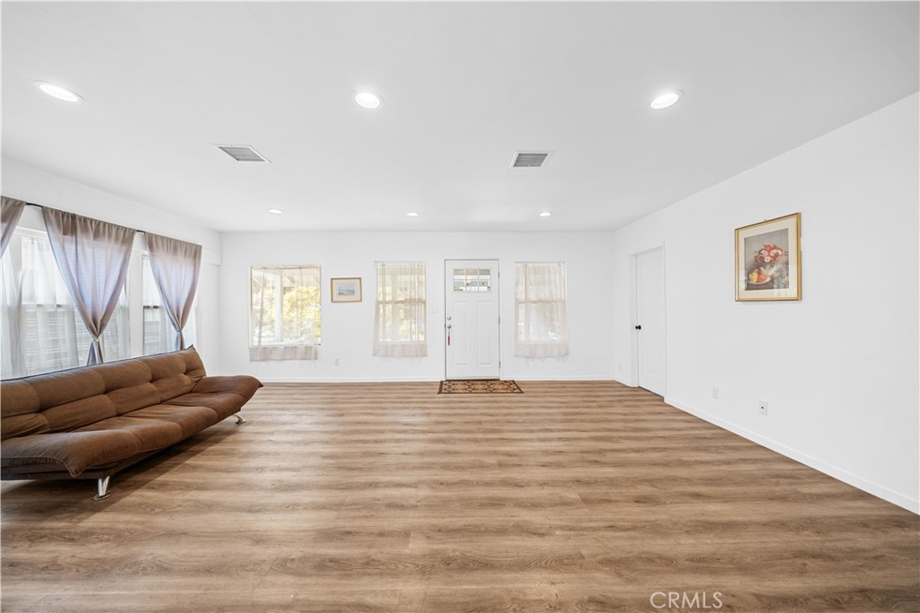 202 Mira Mar Avenue Long Beach, CA 90803 - Photo 8 of 49 a living room with furniture and a large window