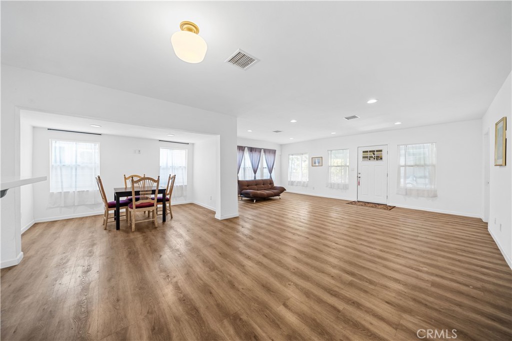 202 Mira Mar Avenue Long Beach, CA 90803 - Photo 9 of 49 a view of a work space with furniture and wooden floor