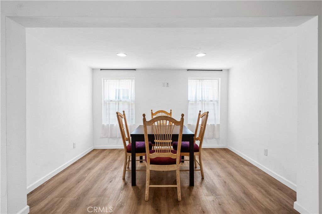 202 Mira Mar Avenue Long Beach, CA 90803 - Photo 10 of 49 a view of a dining room with furniture and wooden floor