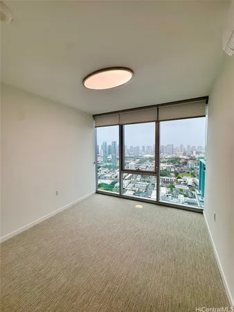 an empty room with a large window