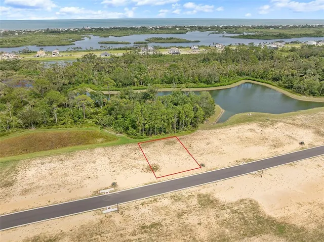 a view of an ocean and a mountain