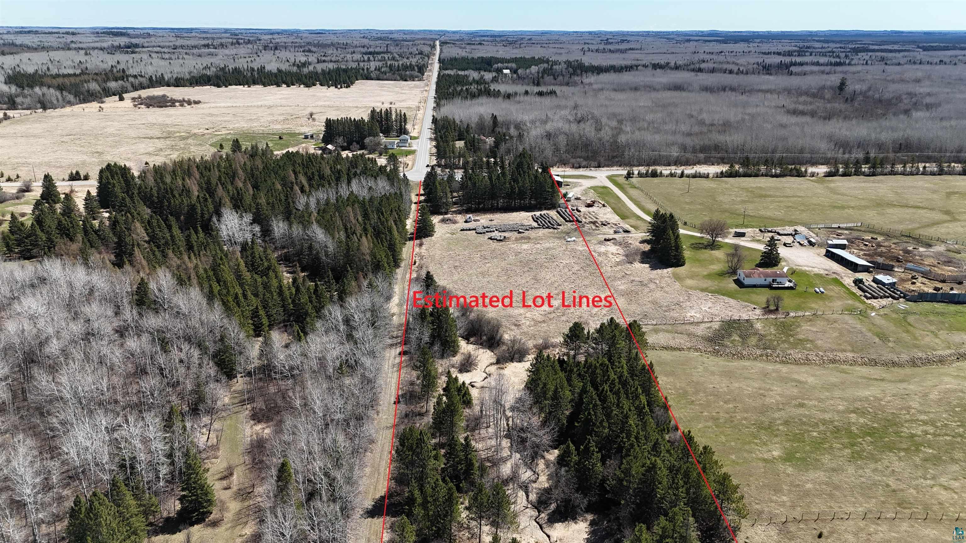 3293 South Greaney Road Orr, MN 55771 - Photo 3 of 17 Expansive agricultural land featuring a mixture of wooded areas and open fields