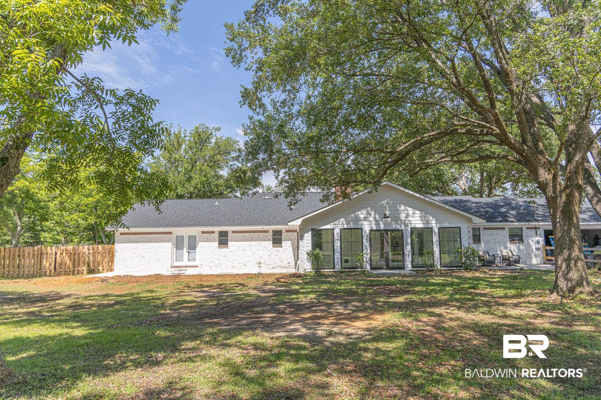 19690 Lawrence Road Fairhope, AL 36532 - Photo 61 of 73 Rear view of house with brick siding