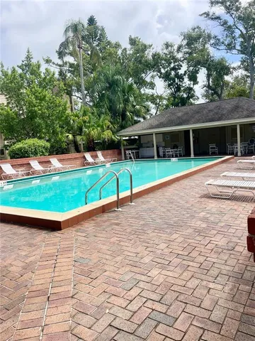 a view of a backyard with a patio