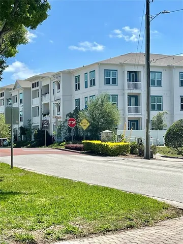 a front view of building with yard