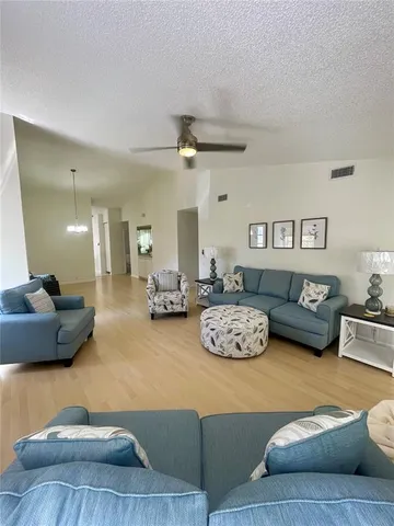 a living room with furniture and a couch