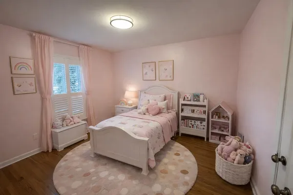 a living room with furniture a fireplace and a window