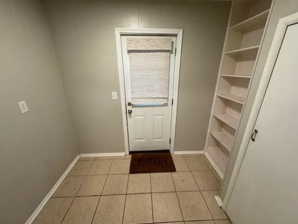 a view of an empty walk in closet