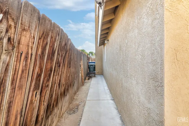 a view of a pathway with a building in the background
