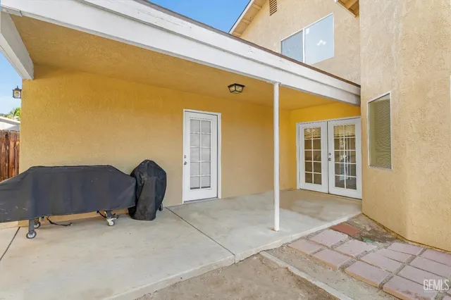 a backyard of a house with seating space