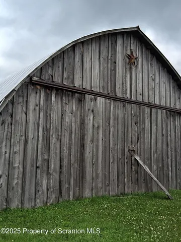 a view of a golf course with a lake