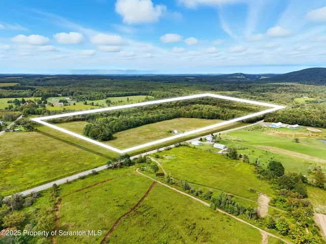 a view of an outdoor space and a lake view