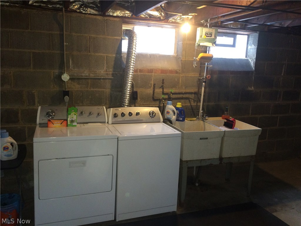 5950 Broadview Road Parma, OH 44134 - Photo 15 of 19 Washer and Dryer along with glass block windows throughout the basement
