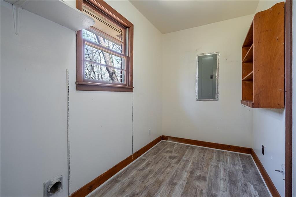 33 Summit Drive Lindale, GA 30147 - Photo 14 of 35 a view of a hallway with wooden floor and a window