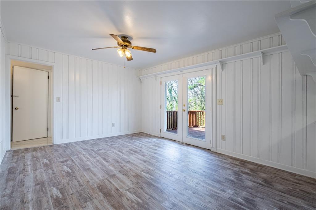 33 Summit Drive Lindale, GA 30147 - Photo 15 of 35 a view of empty room with wooden floor and fan