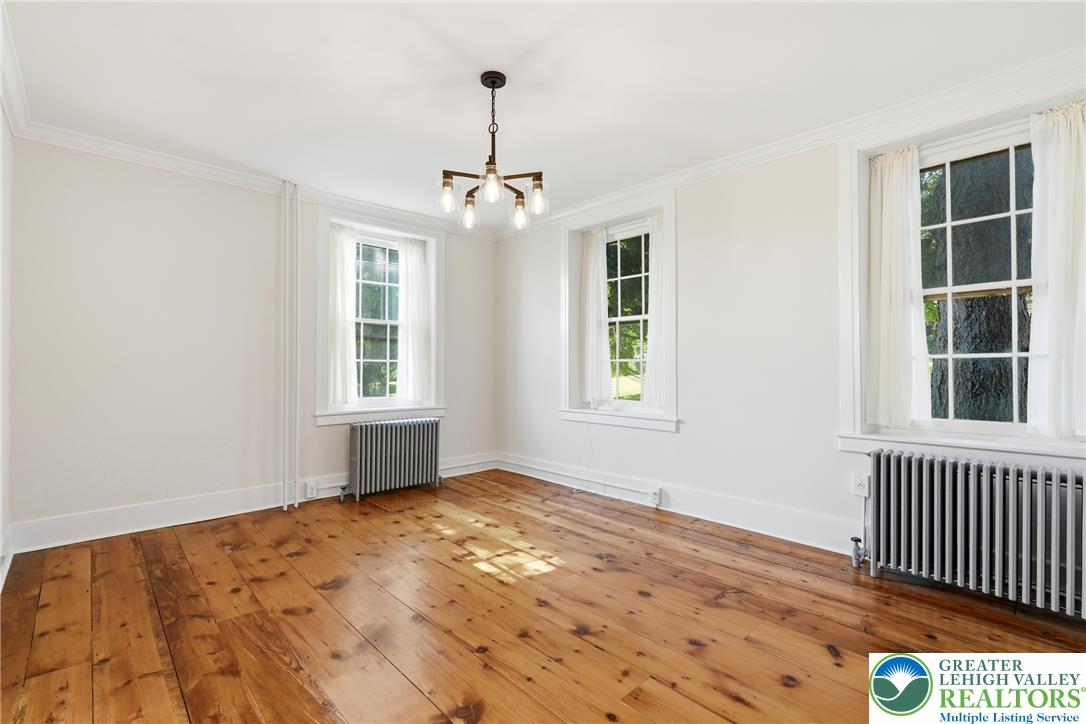 4682 Steuben Road Bethlehem, PA 18020 - Photo 11 of 79 Rich hardwood flooring and ample window light define this inviting interior space.