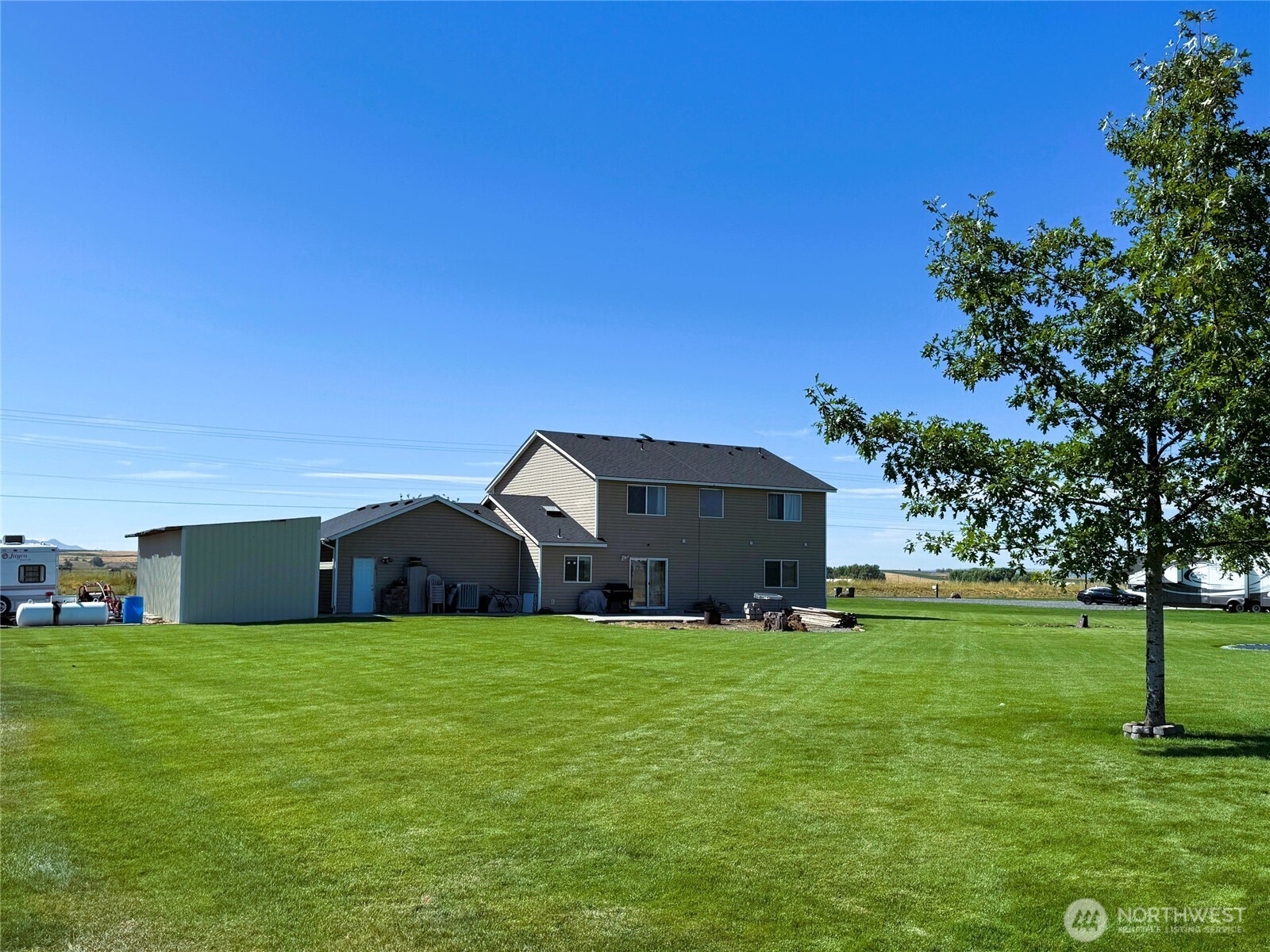 849 South McKinney Road Othello, WA 99344 - Photo 34 of 39 a view of a house with a yard