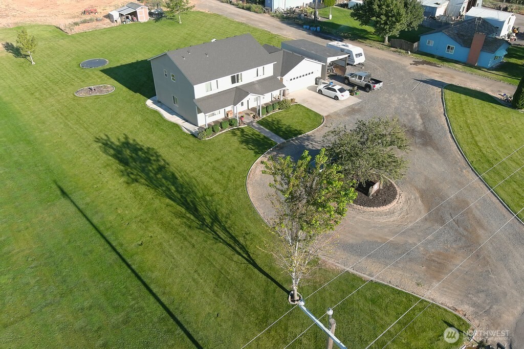 849 South McKinney Road Othello, WA 99344 - Photo 39 of 39 an aerial view of a house with a yard