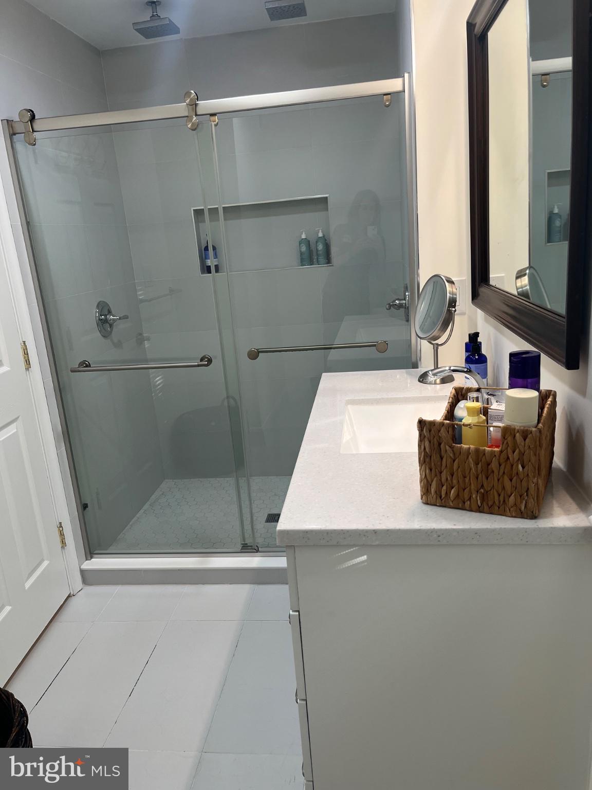 304 Old Courthouse Road Northeast Vienna, VA 22180 - Photo 21 of 25 Modern bathroom with sleek design.