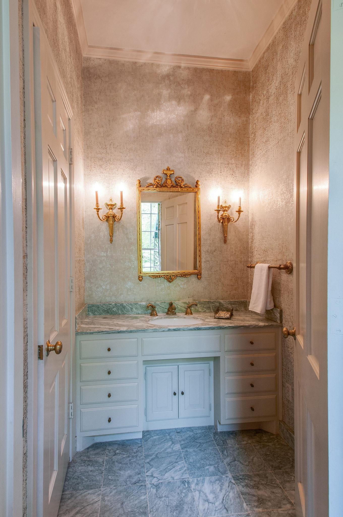4737 Post Road Nashville, TN 37205 - Photo 13 of 30 a bathroom with a double vanity sink and a mirror