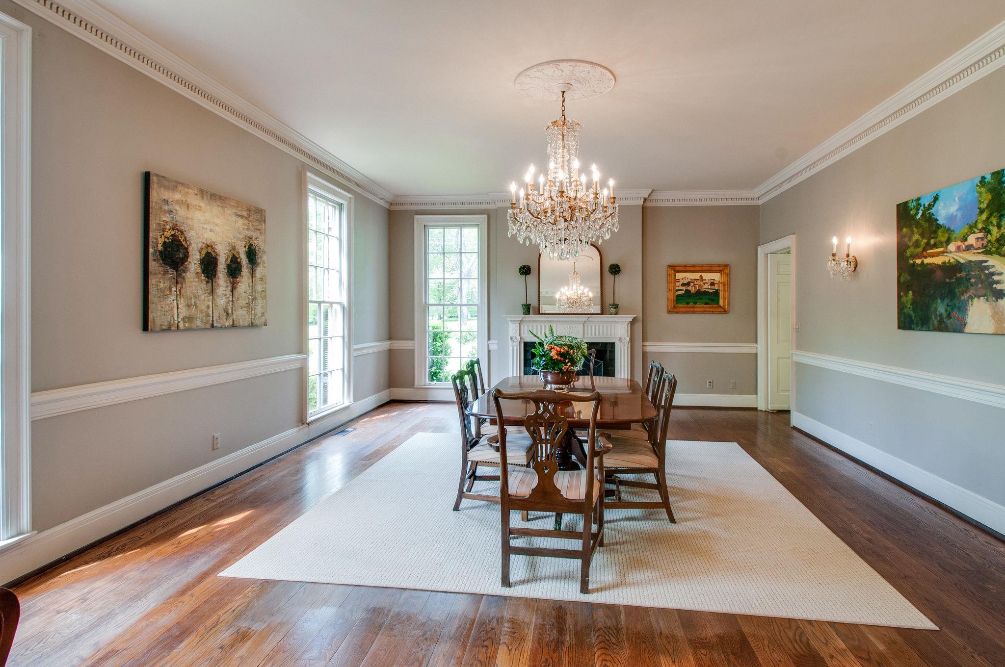 4737 Post Road Nashville, TN 37205 - Photo 15 of 30 a view of a dining room with furniture a chandelier and wooden floor